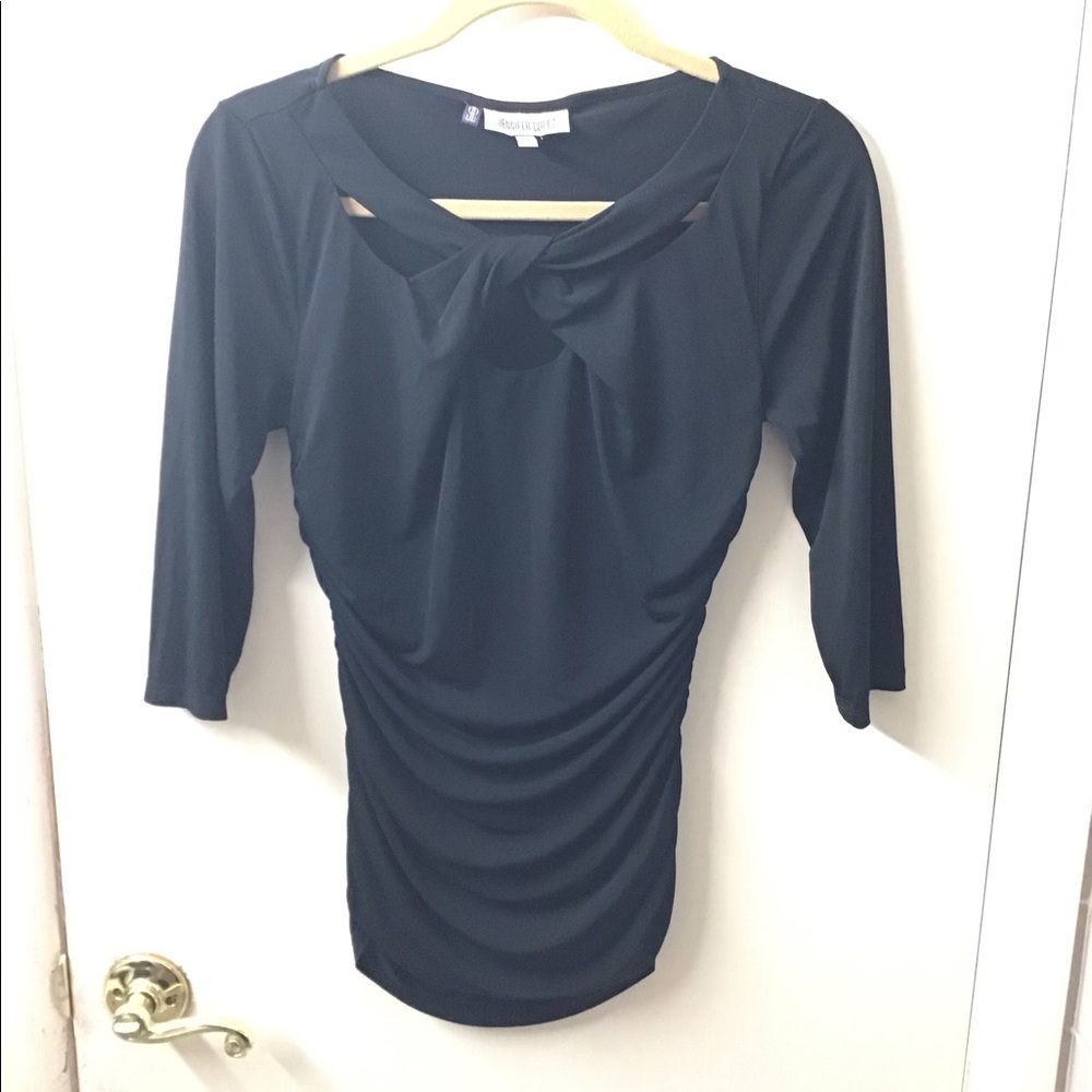 Jennifer Lopez black criss-cross 3/4 sleeve top.